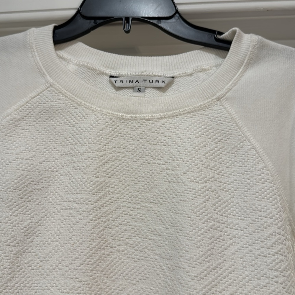 Like new - Gorgeous Trina Turk top. Size small. White color.